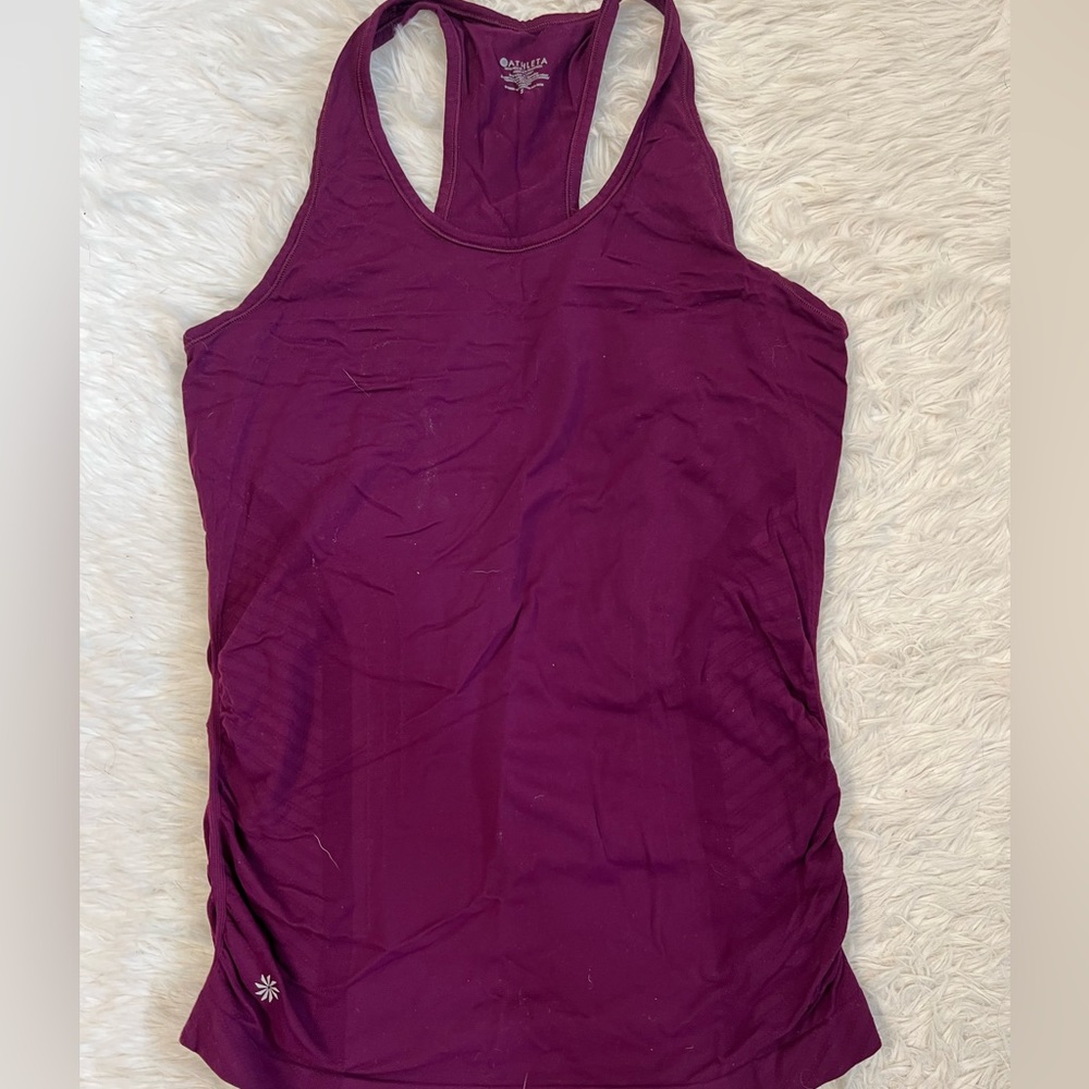 Size S Athleta tank top. Purple. waist grips. No holes or stains